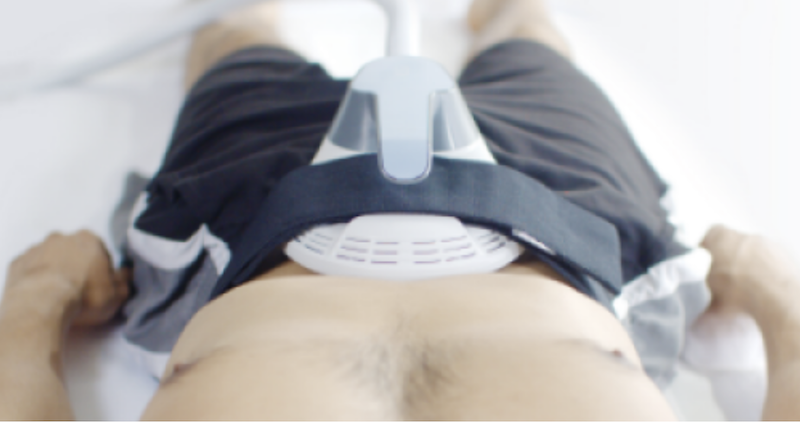 Man Receiving Emsculpt Treatment